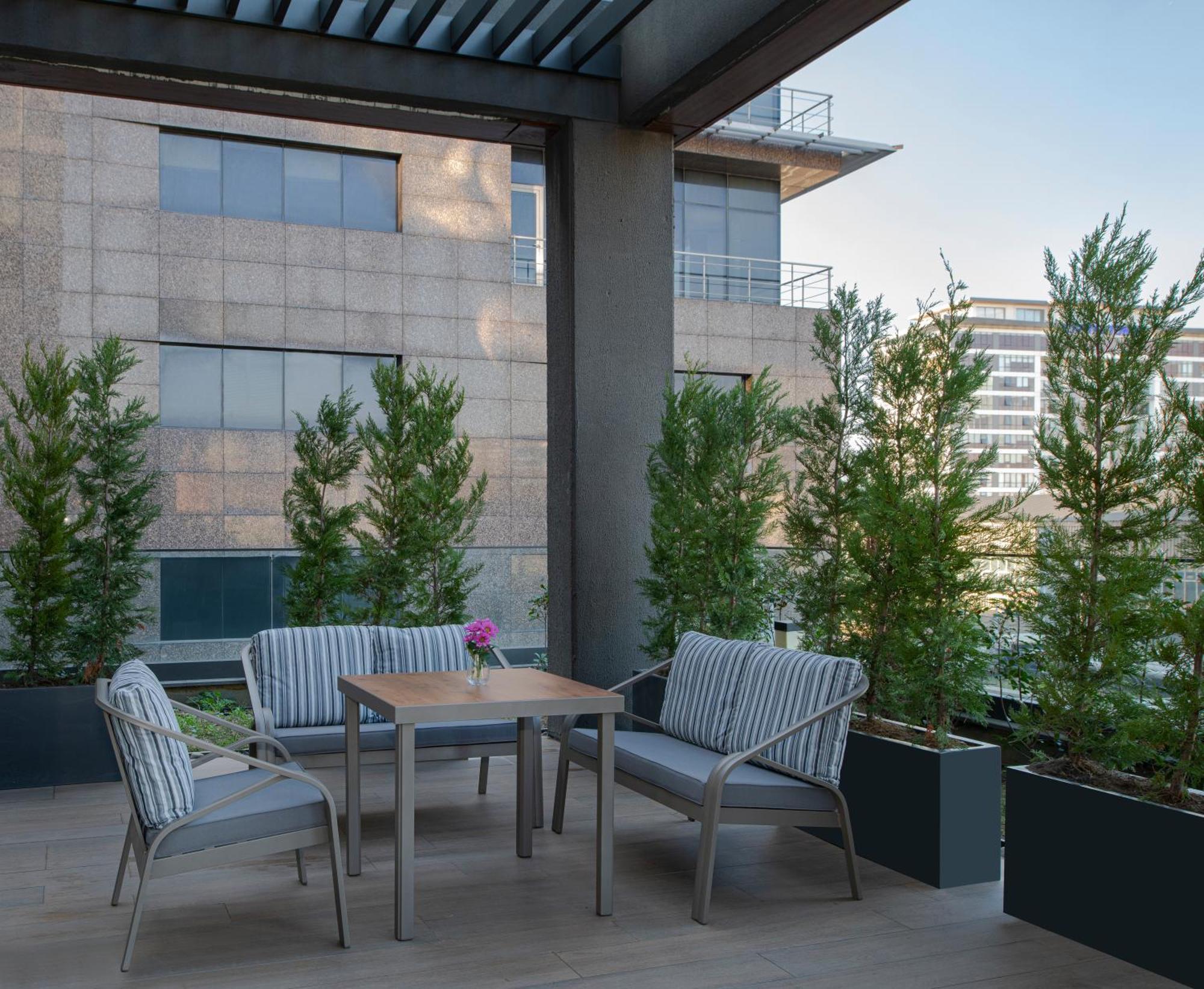Movenpick Living Istanbul West Hotel Kültér fotó A 3D rendering of a patio